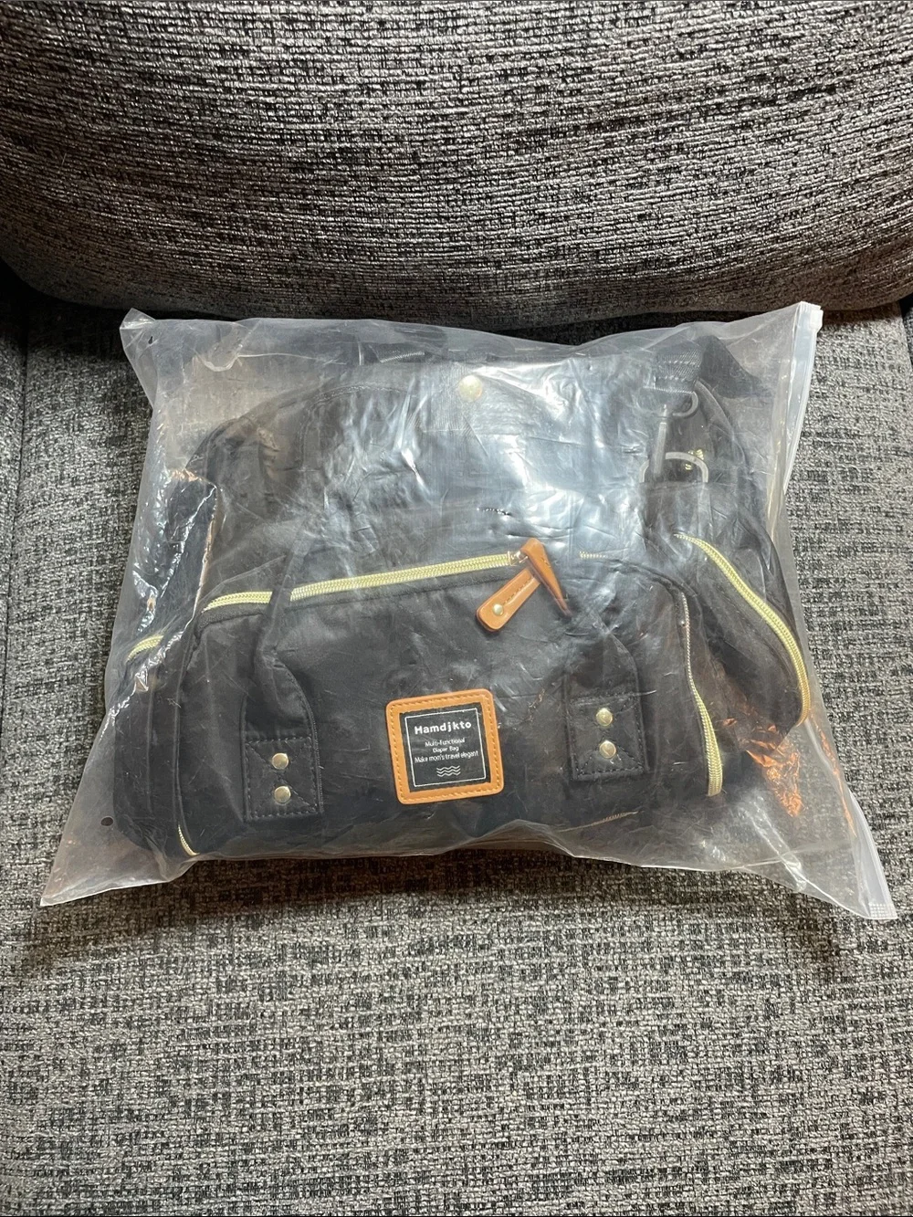 Classic Black Baby Bag Backpack with Tan Accents